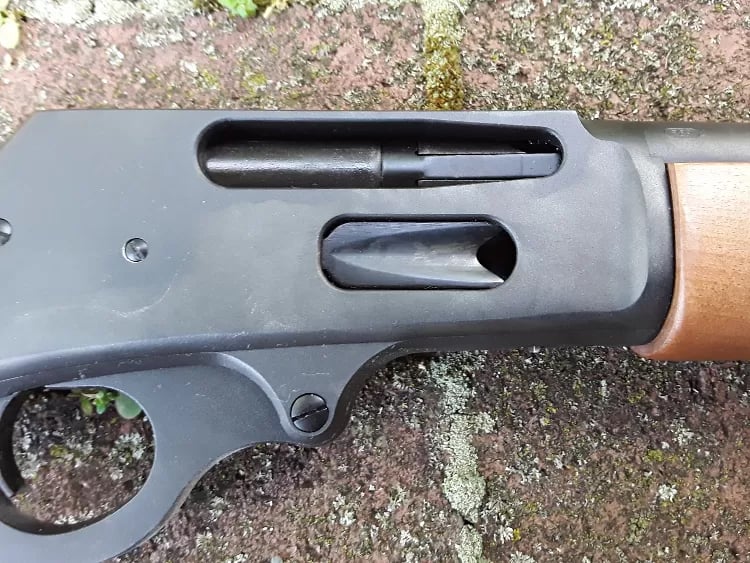 The tubular magazine of a lever action can be topped off one round at a time. 