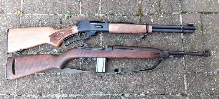 The Marlin beside the M-1 Carbine. The small M1 Carbine is widely know for its hardiness.