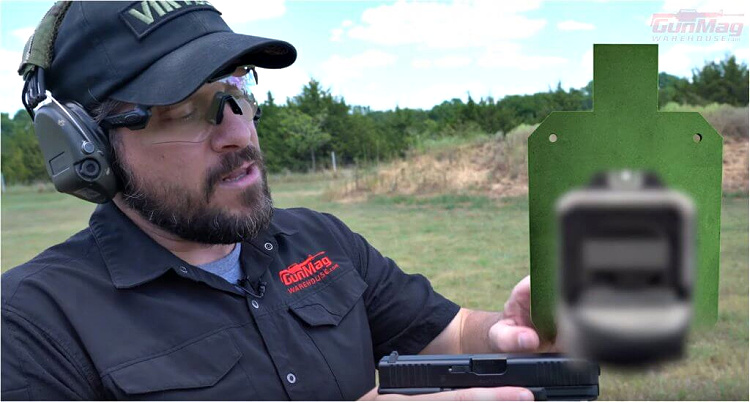 Aiming a handgun. Soft front sights, soft rear sights, but aligned and superimposed over the target area - it works well, particularly for those who have corrected vision.