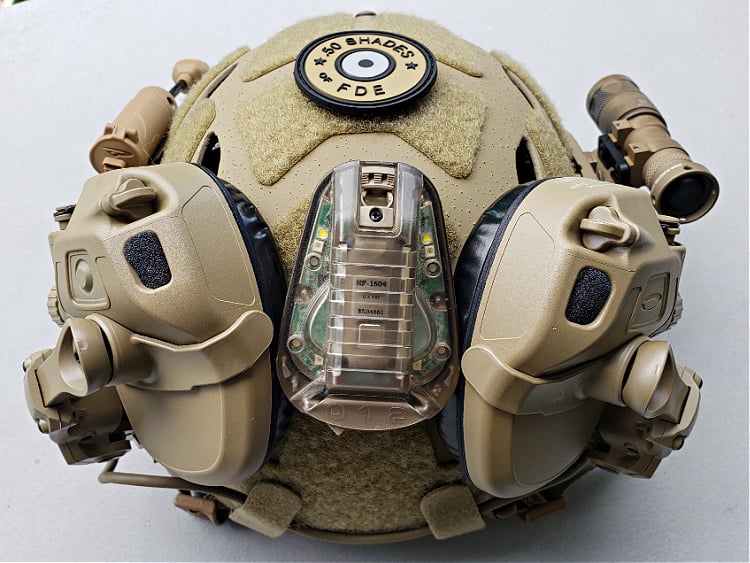 Ops-Core Bump Helmet with AMP headset and Helstar 6 multi-function light.