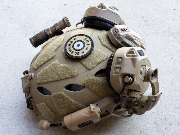 Ops-Core Bump helmet with AMP, SureFire M300V, Thyrm Variarc mount, and Helstar 6.