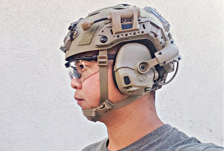 Ops-Core bump helmet with AMPs and eye protection.