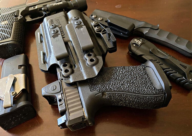Universal holster pictured with my Gen 5 Glock 19 from Agency Arms with an RMR, the Floodlight allows for RDS as well as suppressor height sights”
