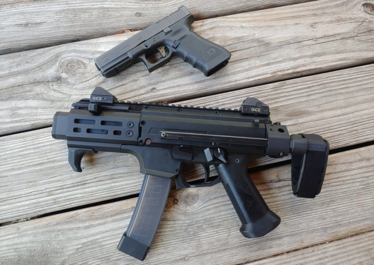 two pistols, one with SB Tactical Stabilizing Brace.