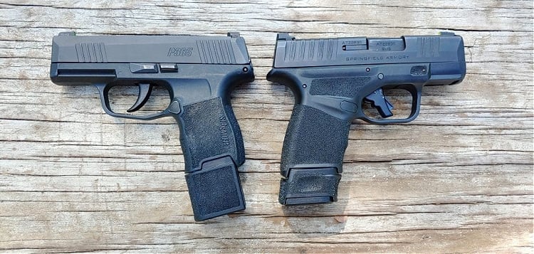 Sig P365 and Springfield Hellcat, side by side with 15-round magazines.
