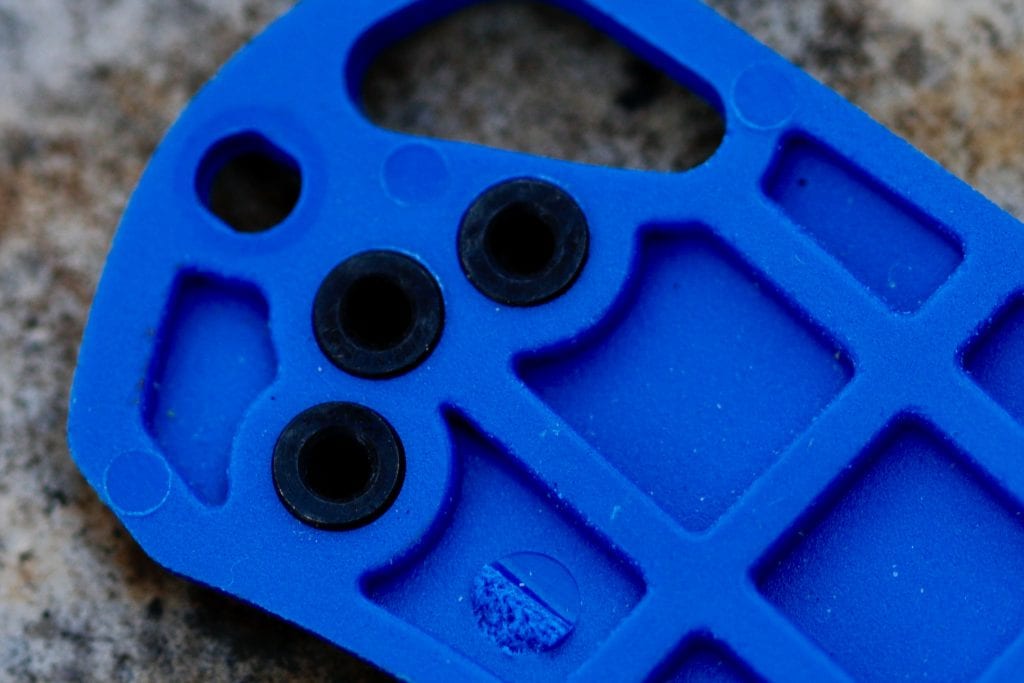 The three clip connectors inside the original blue scales.