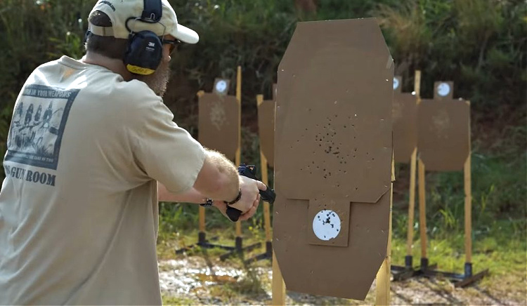 man participating in pistol red dot training class