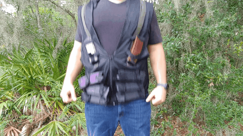 Forgotten Weapons HEAT replica vest, GIF of magazines falling out when the person wearing it jumps.