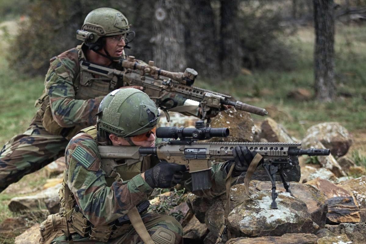 In Action: MARSOC Raiders running a DMR and CSASS in tandem during a training exercise. Both are KAC SR25 M110K1s, and complement each other in the context of a Sniper/Spotter team.