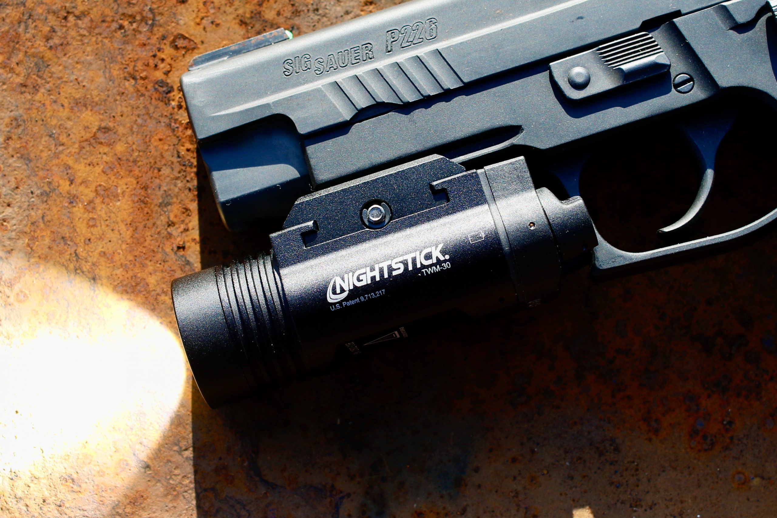 The Nightstick TMW-30 with insert #2 connects in the 1st slot on the P226, but won't go farther back.