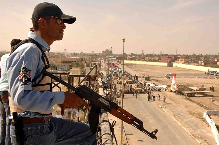 Iraqi Police officer packing a Zastava M70.