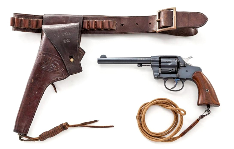 Colt 1901 revolver with belt, holster, and lanyard.
