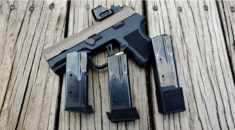 Sig P320 with the Amend2 s300 grip module and a 10, 12, and 15-round magazine.