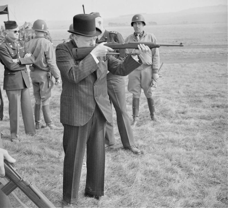 Winston Churchill firing an M1 Carbine