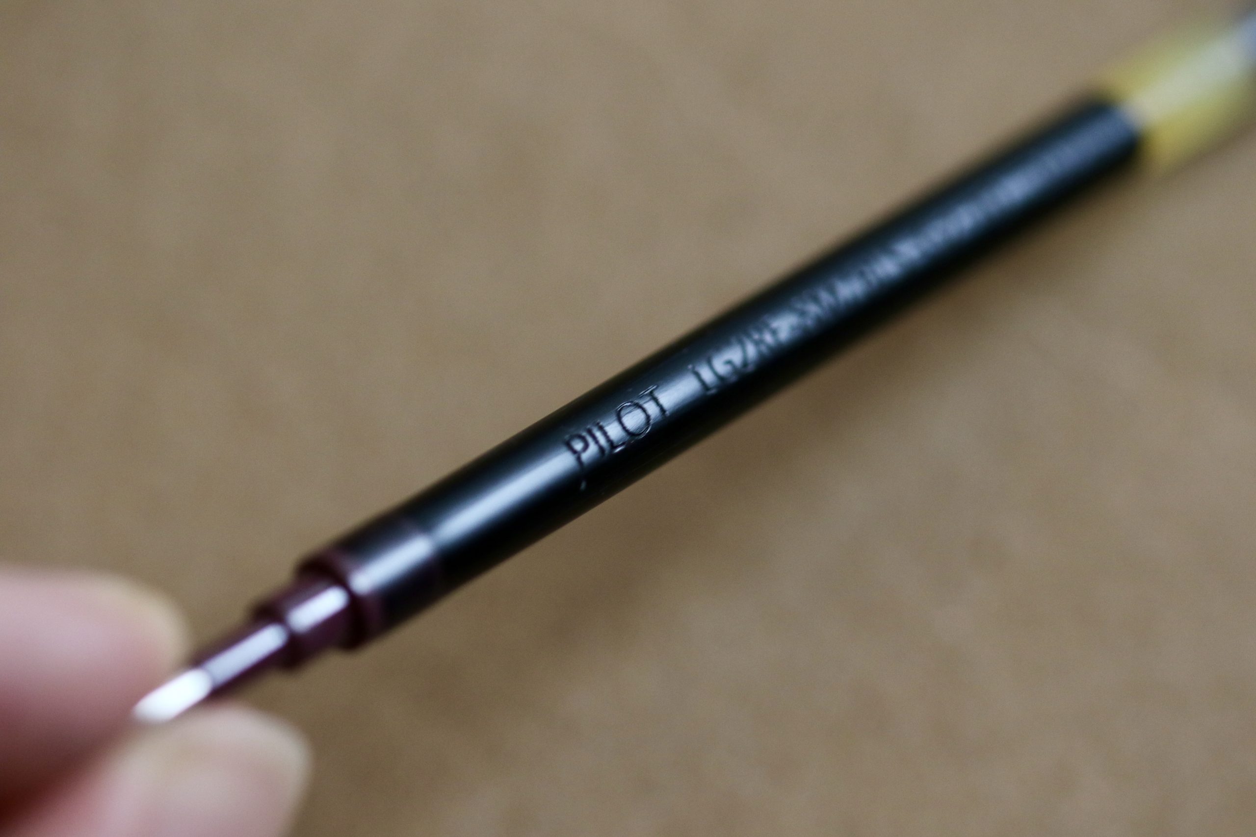 The Pilot G2 bolt action pen refill. These are easy to find and come in a rainbow of colors.
