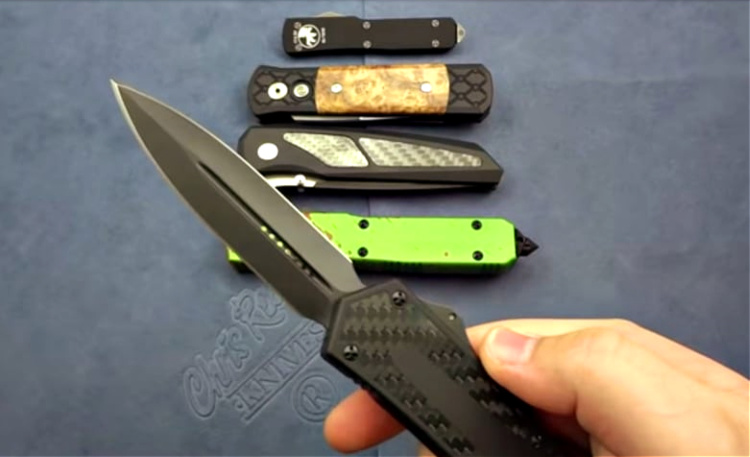 Automatic knifes - Microtech Scarab out the front double-edged blade.