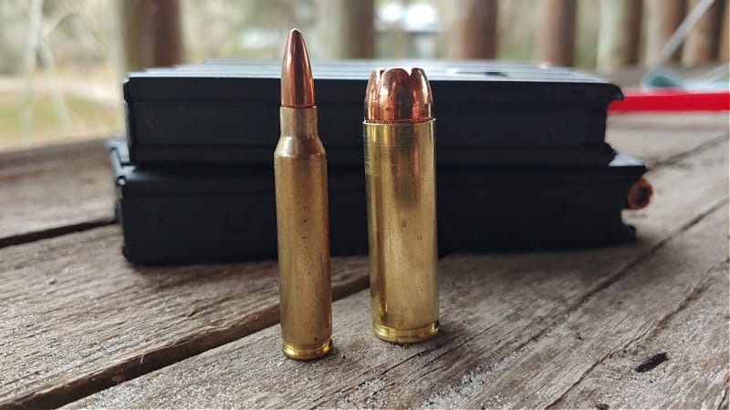 500 Auto Max cartridge next to 5.56