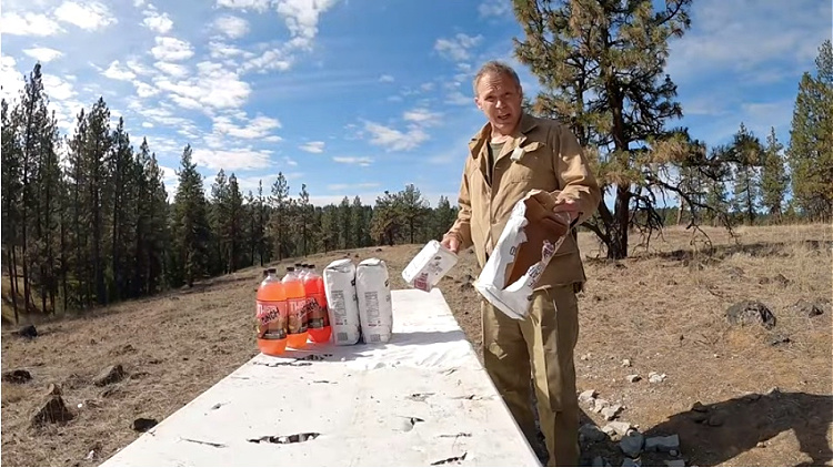 Paul Harrell testing the bullet resistance of sugar bags.