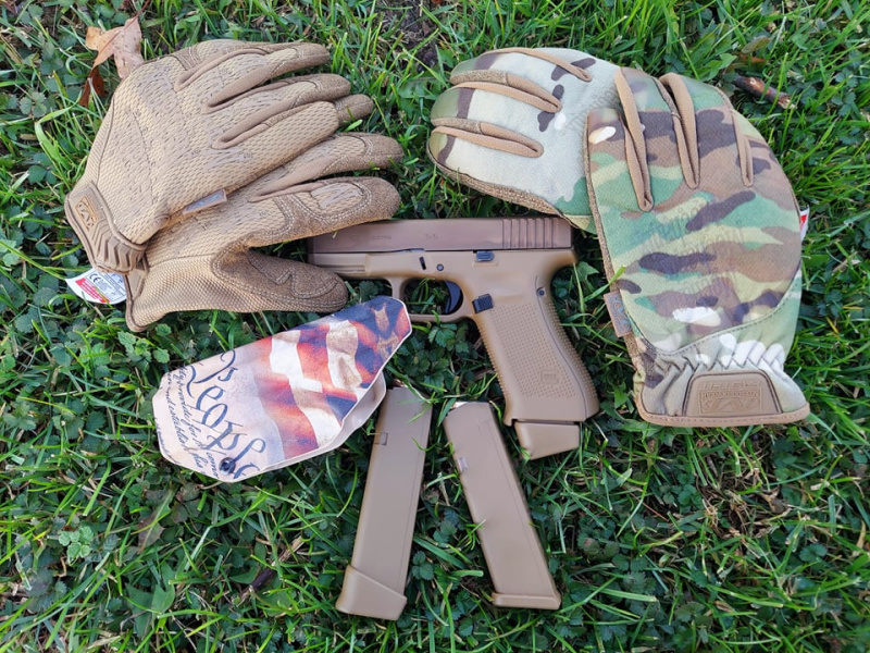 Glock 19 with Mechanix shooting gloves in FDE and MultiCam