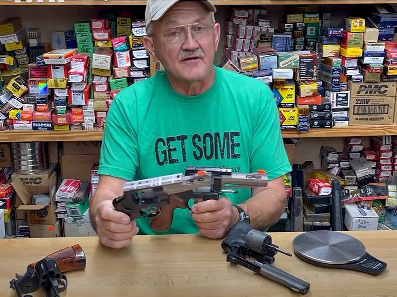 Jerry Miculek with two Smith & Wesson Model 327 revolvers