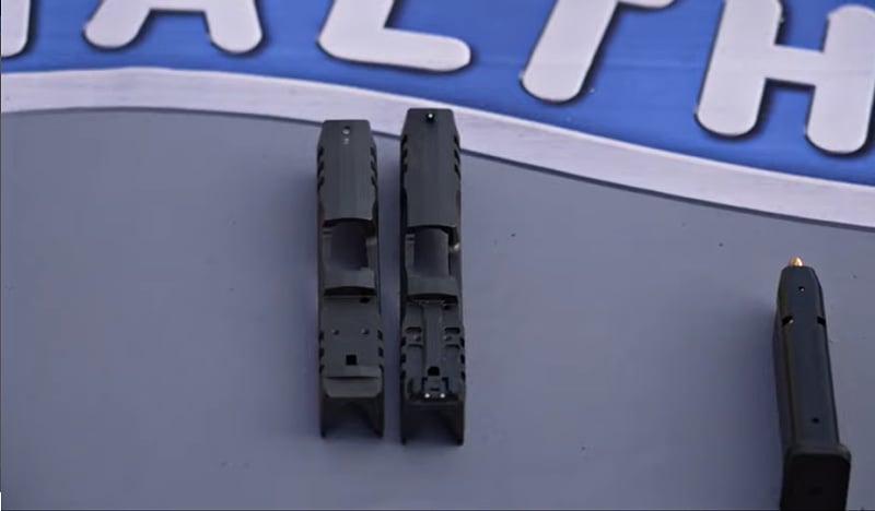 Walther PDP slide next to PDP Pro SD slide which has recoil lugs