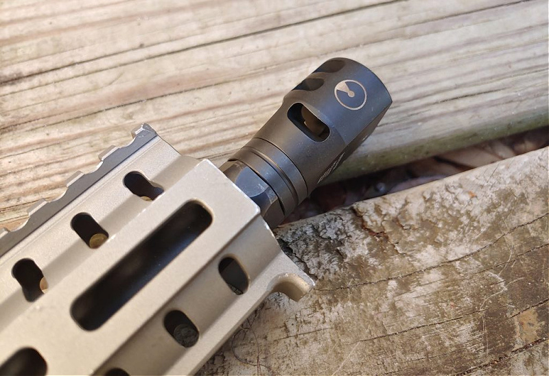 PCC compensator side ports for recoil reduction