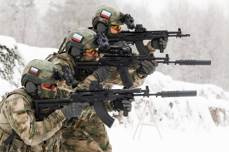Russian special ops soldiers with suppressors and a flash hider on their AK-12s.