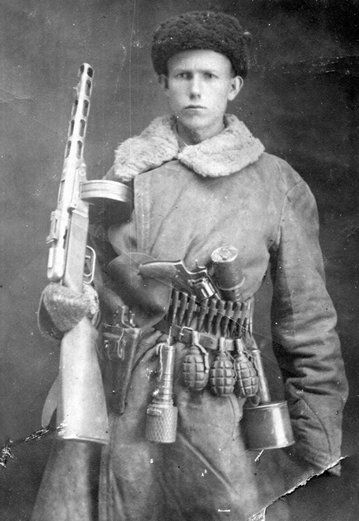 soviet soldier with two Nagant M1895 pistols and PPSh submachine gun