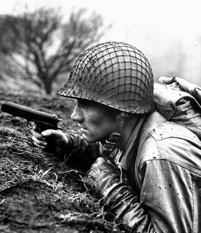 Black and white image of American soldier with 1911