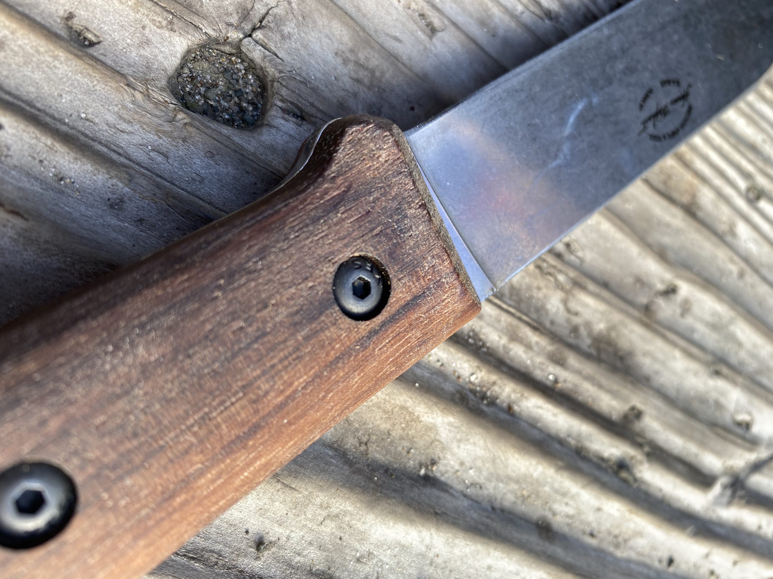 The blade stock on the BK62 is thin, and the flat grind goes all the way to the spine. 