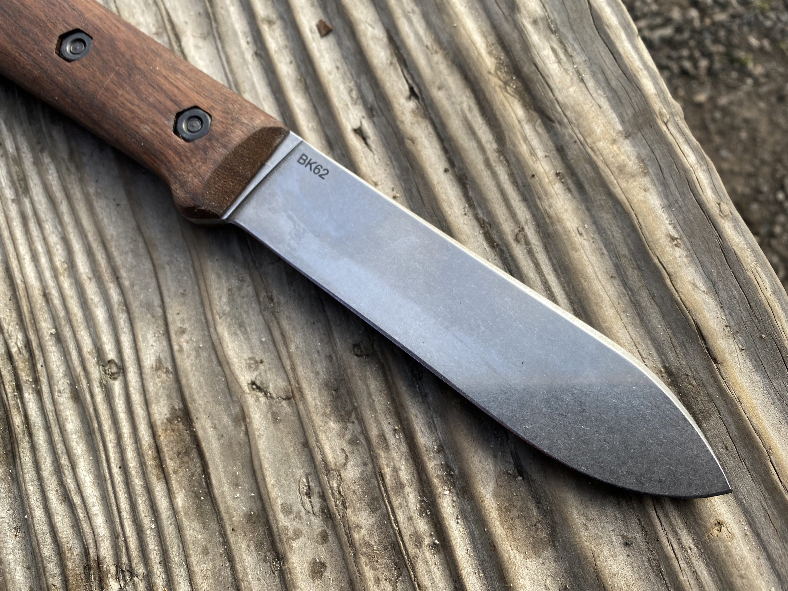 The blade on the Becker is 5.1" long. Not short, but not long, either. 