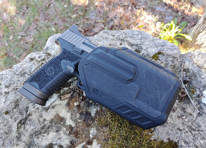 FN Handgun, holstered