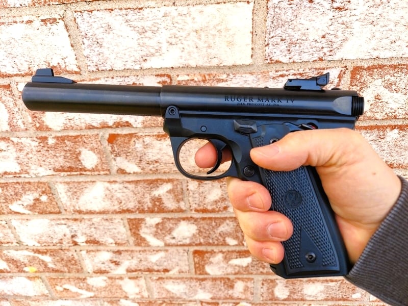 Ruger Mark IV 22/45 pistol in hand