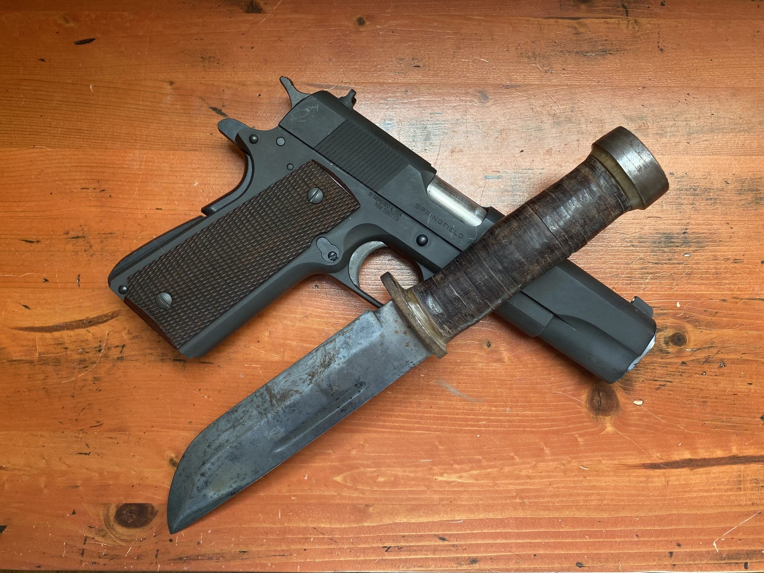 Cattaraugus knife and 1911 handgun