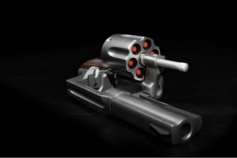 The Taurus 856 Executive Grade revolver with the cylinder open.