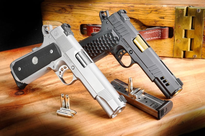 Two 30 Super Carry 1911s manufactured by Nighthawk Custom