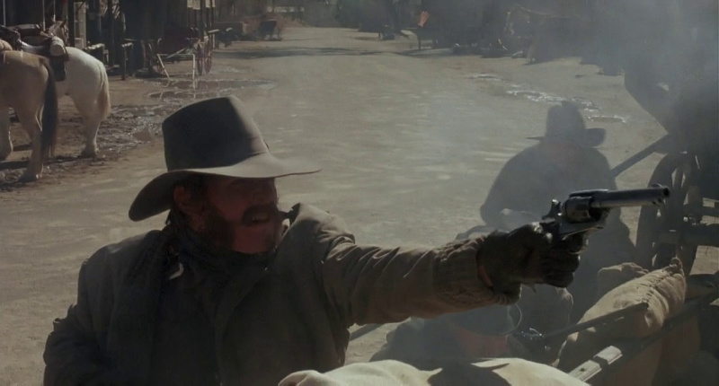 Tom Cruise with a Single Action Army revolver in Young Guns
