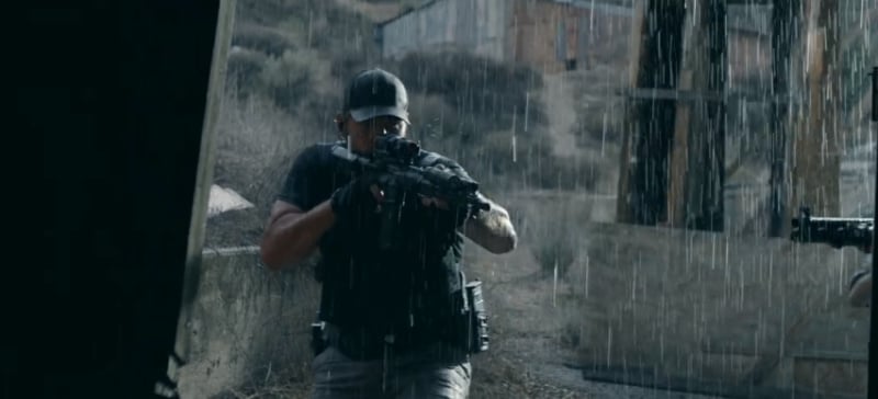 James Reece character in The Terminal list aiming a rifle with an Aimpoint, OWll, AND pmag