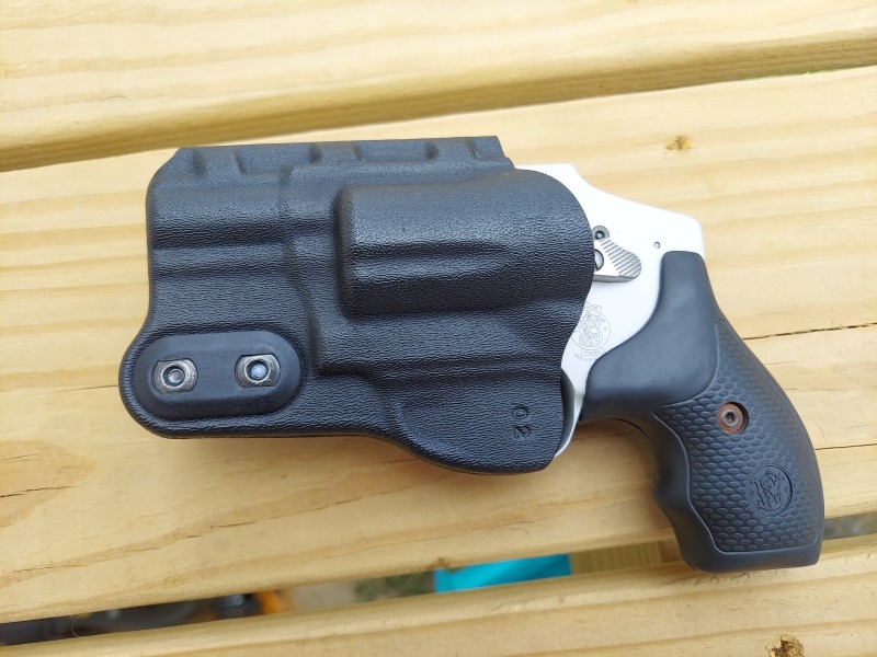 For safety, the holster completely covers the trigger guard of the S&amp;W 642. The revolver clicks in when holstered.