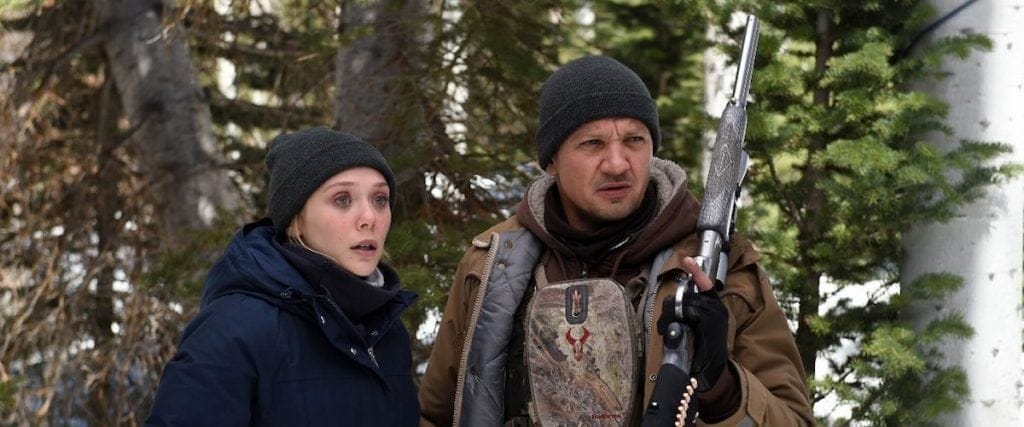 Wind River scene with Corey holding a Stainless Big Lever