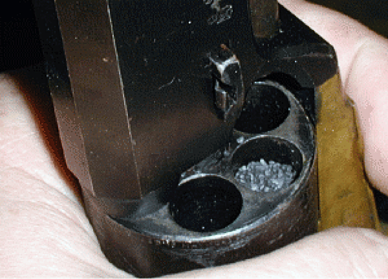 A visual example of loading the chambers of a cap and ball revolver.