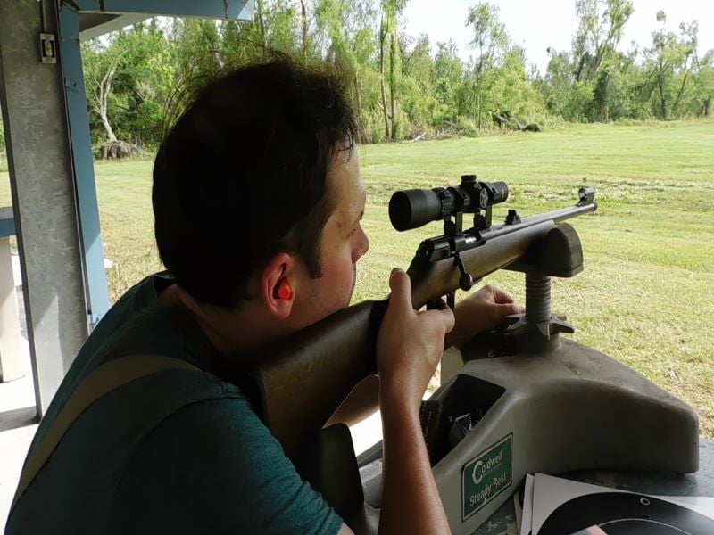 Shooting the CZ 457 Scout from a bench rest.