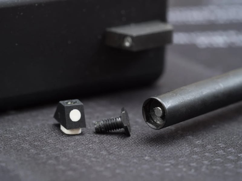 Custom bit designed to aid in the assembly and disassembly of Glock Front Sights.