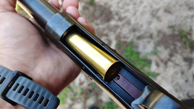 brass shotshell chambered in tubular shotgun mag