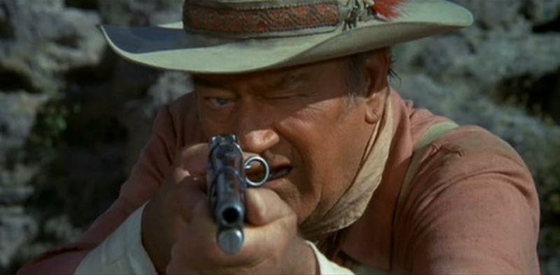 John Wayne with a Winchester 1892 in the movie Big Jake.
