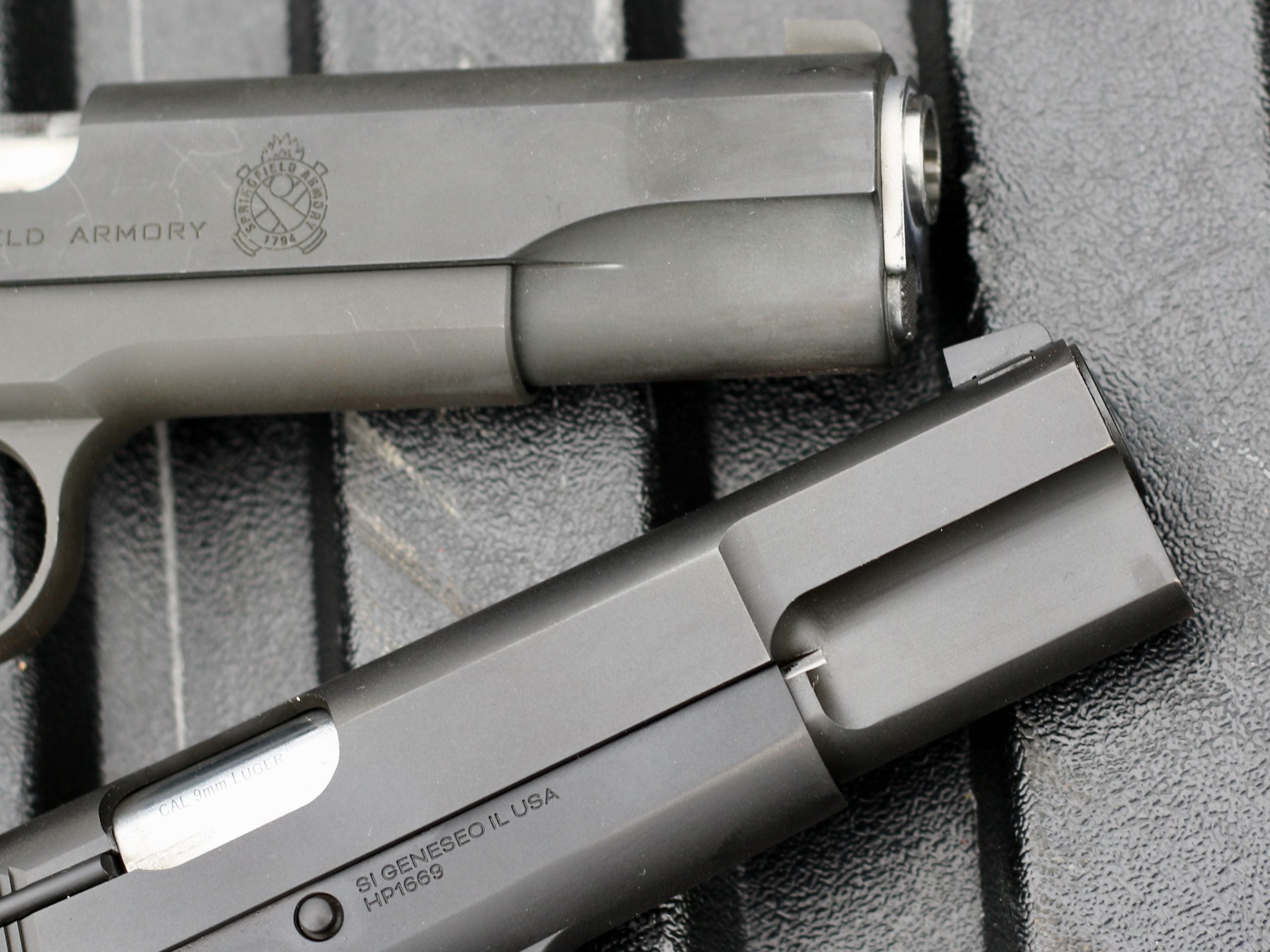 closeup view of 1911 and SA-35 barrels