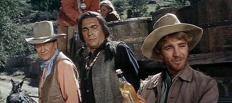 John Wayne, Howard Keel, and Robert Walker, Jr. in The War Wagon