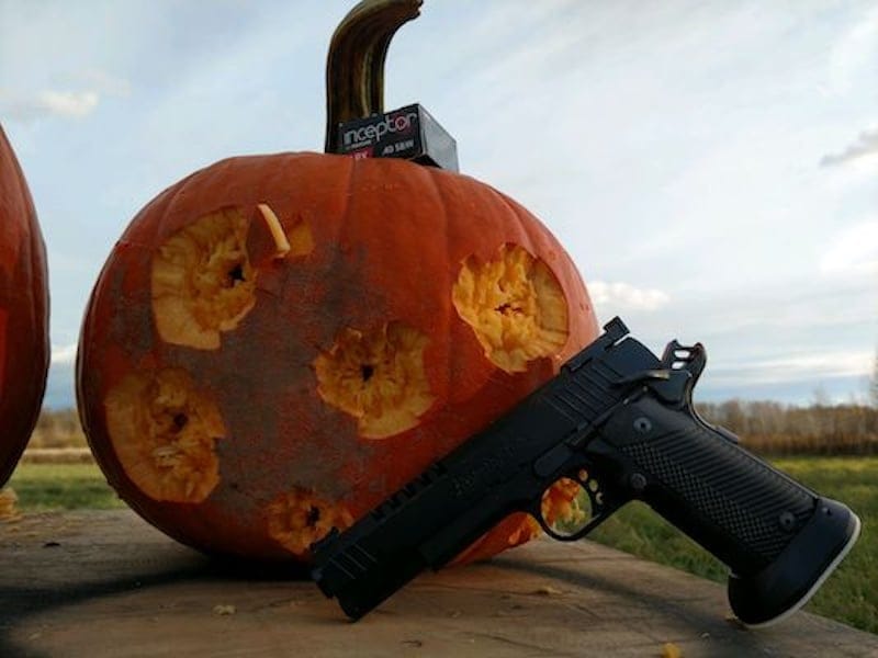 jack-o-lantern carved with 40 Smith and Wesson