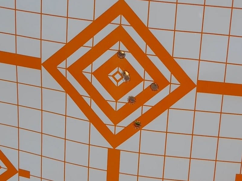 shot group on a paper target at seven yards.
