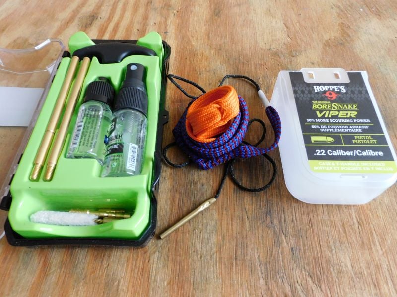 A small gun cleaning kit paired with a cleaning rope.